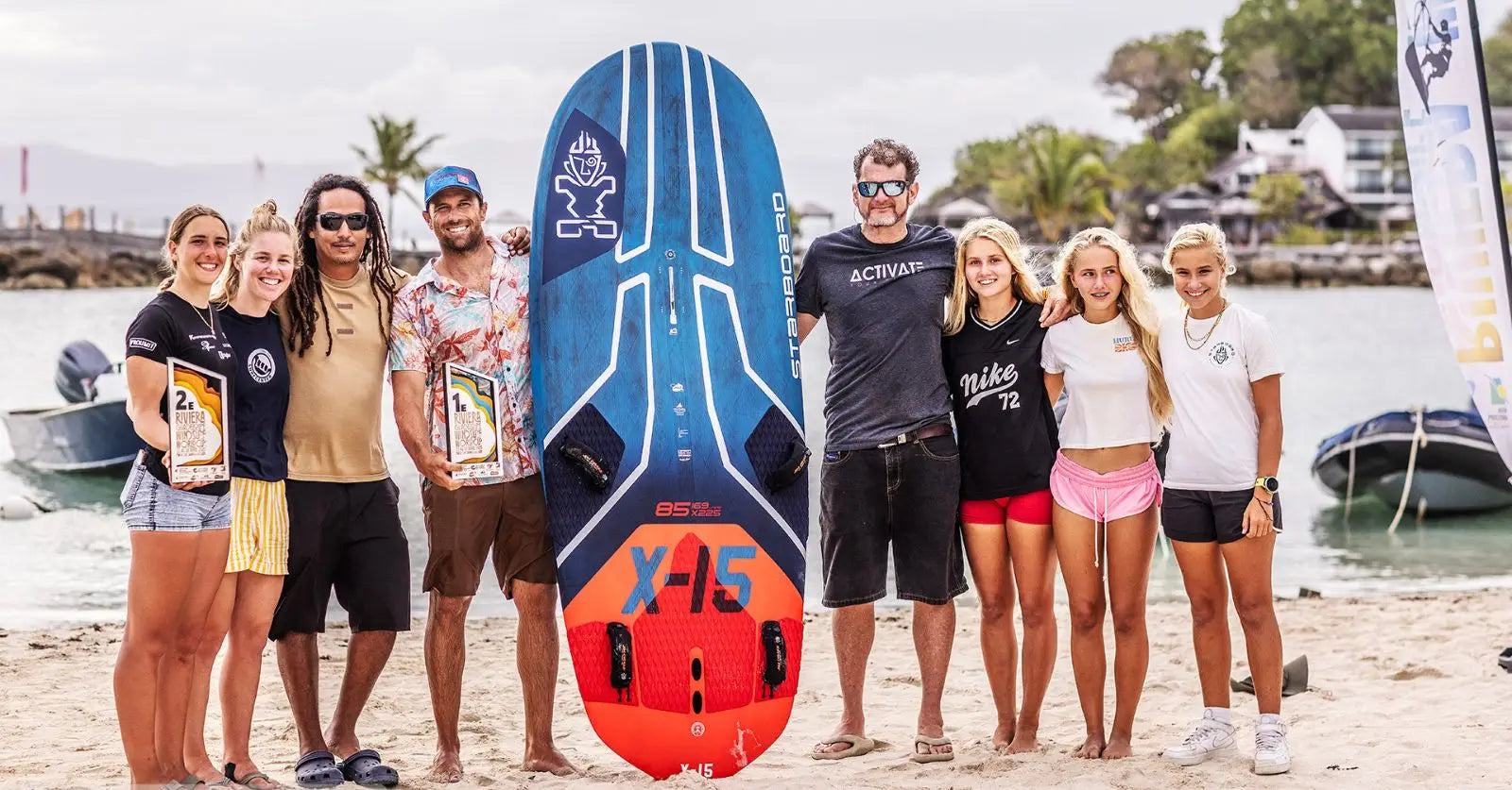 Blue and orange windsurfing board with black graphics for 16th PWA title