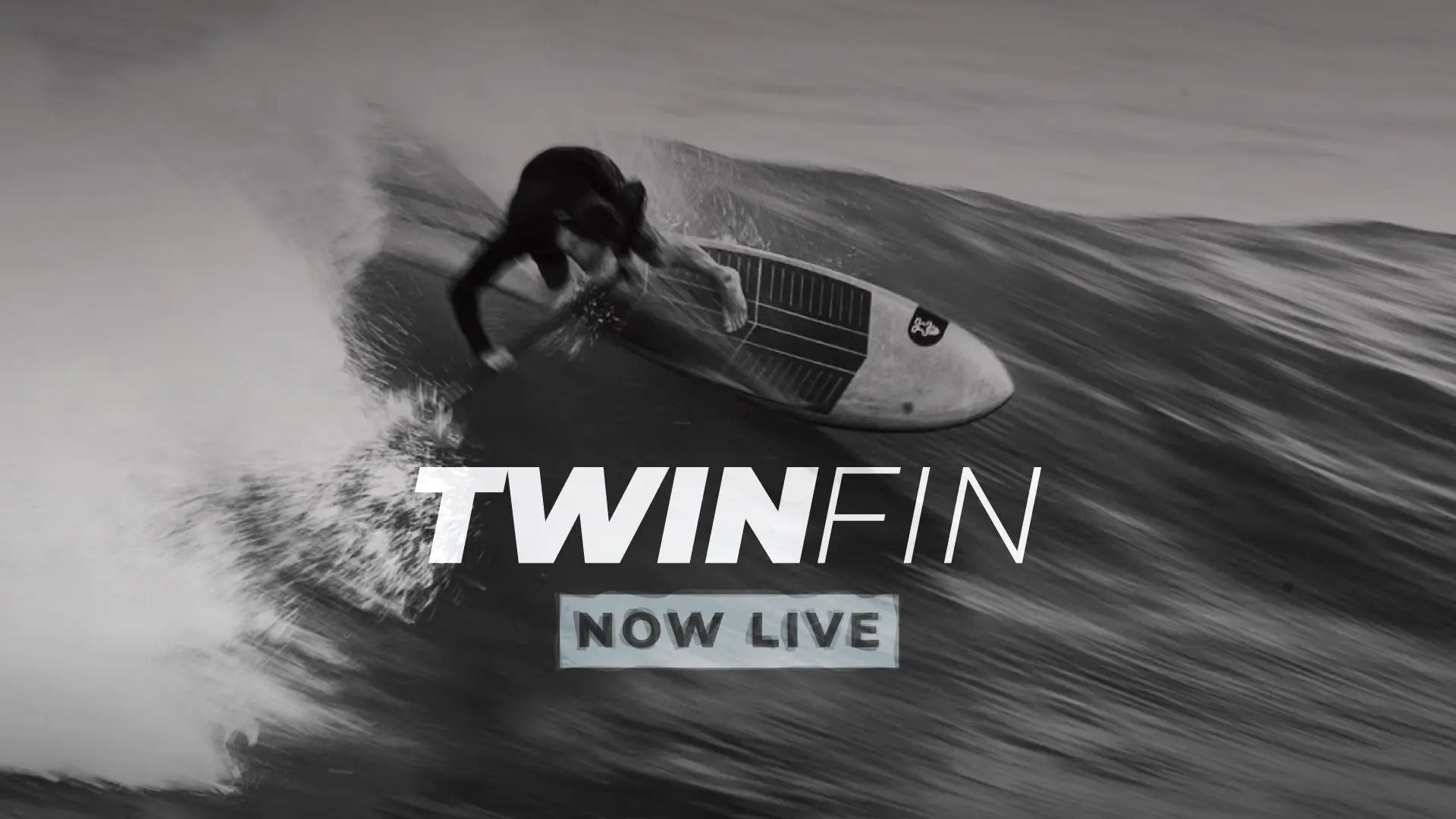 TwinFin surfboard: sleek modern twin fin with white black design