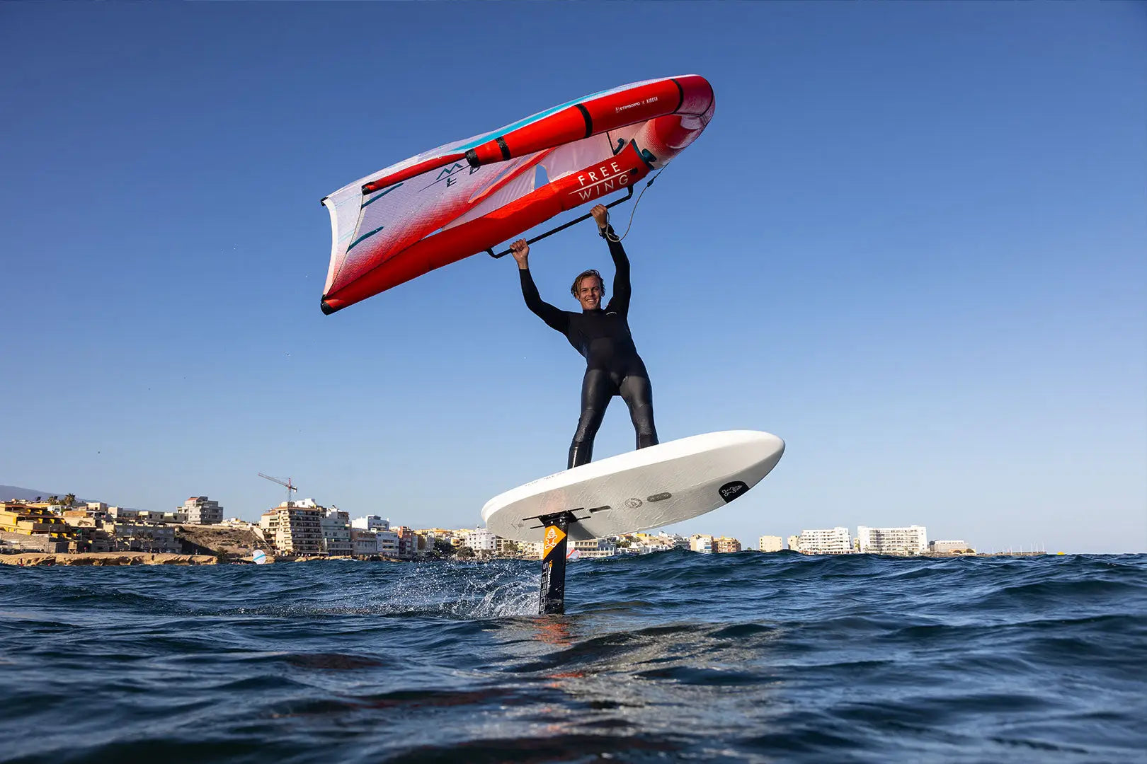 Red and white 2025 Foilboard hydrofoil with black fins