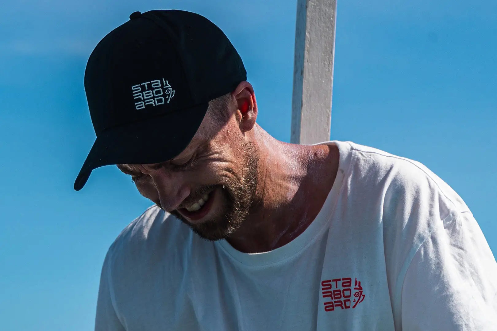 Black cotton baseball cap with Stay Bold text and logo