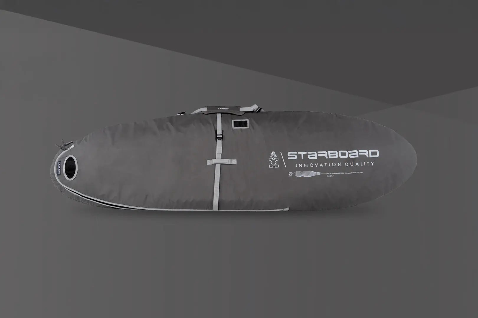 Starboard Innovation SUP surfboard with black and white design, silver hardware